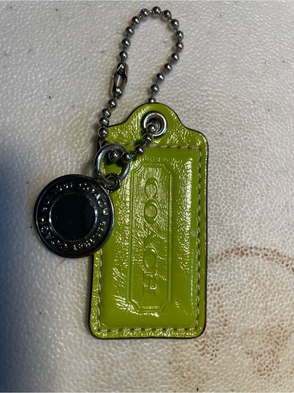 Coach Lime Green Patent Leather Key Fob with Silver-Tone Logo Charm